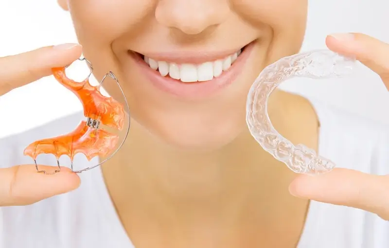 Czy leczenie Invisalign boli?